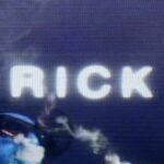 Rick (white letters on an indistinct background, as from a closeup of a TV screen showing individual pixels)