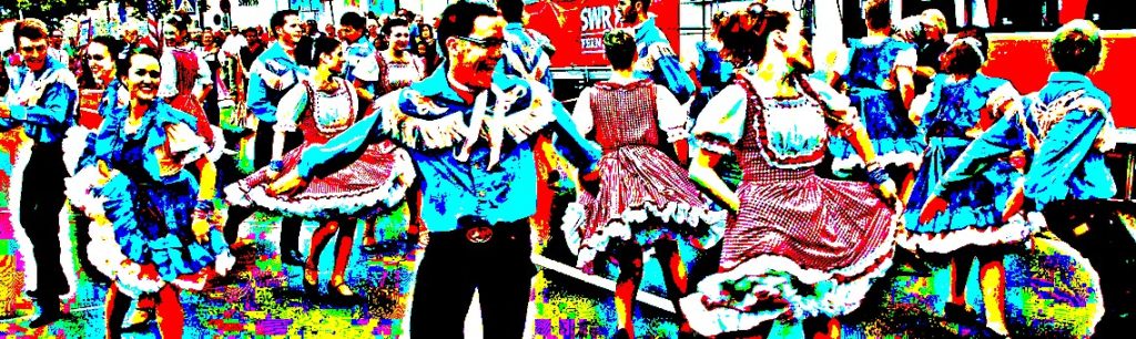 People square dancing in the street (solarized image)
