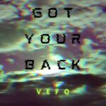 GOT YOUR BACK | VEFO (black and yellow lettering on an indistinct background that looks like an anaglyph 3D image)