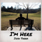 I'm Here | Josh Taerk (man sitting on a park bench facing away from the camera. There is a dead-looking tree in front of him)