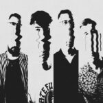 (B&W solarized, elongated, wiggly photo of four men)