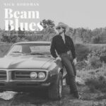 Nick Bordman | Beam Blues | (Live at Locust Ridge Studios) (black and white photo of a man with a beard and wearing a cowboy outfit leaning against a sporty-looking car)