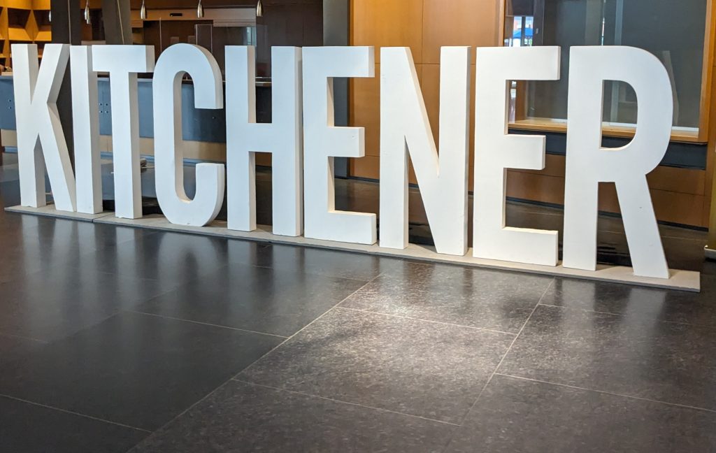 A large 3 foot high and roughly 10 feet letters that read "Kitchener".