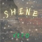SHINE | VEFO (white and green lettering on a background of stars overlying a beach scene with a cliff to the left)