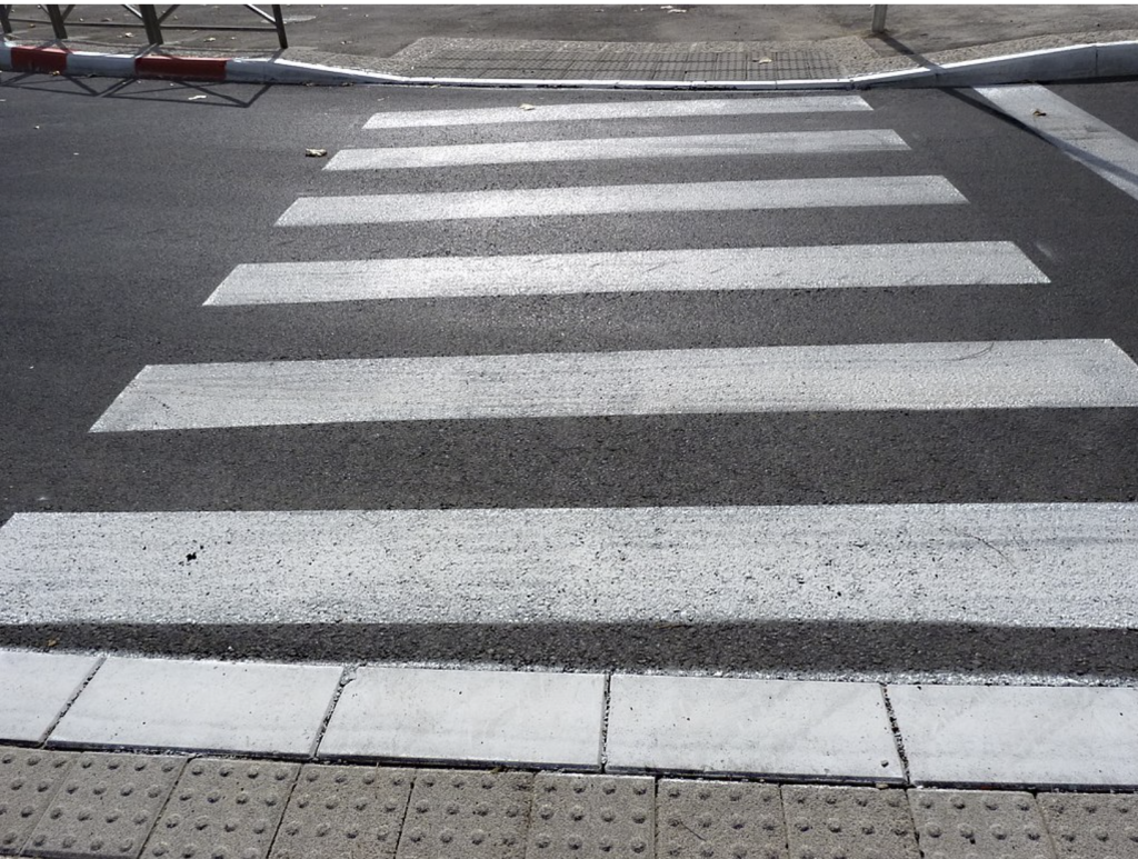 The image of a new crosswalk on a city street