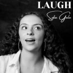 Laugh | Spfia Gale (B&W photo of a woman laughing, looking off-camera)
