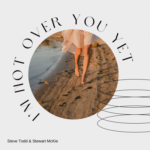 I'm Not Over You Yet | Steve Todd and Stewart McKie (photo of a girl's legs walking in the sand of a beach)