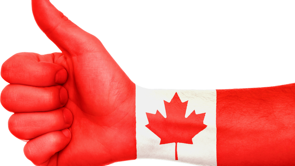 Hand with thumb up, Canadian flag painted on arm