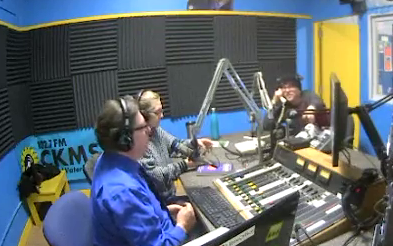 Bob Jonkman, Yenny Stronge, and DJ JD in the control room