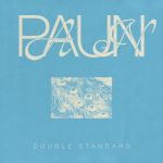Paun | Double Standard (half-toned white&blue image of peacock feathers;  blue letters on a pale blue background