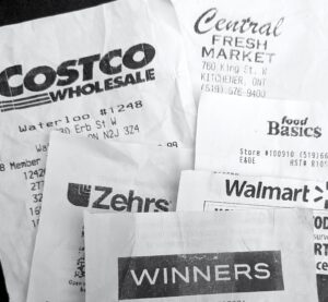 a pile of grocery receipts from stores in Kitchener-Waterloo